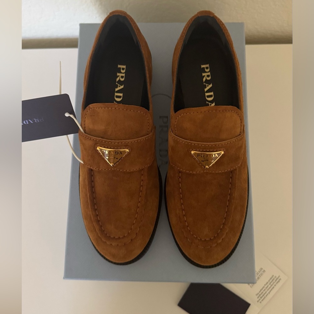 Prada women’s Tan Suede Slip-On Loafers
